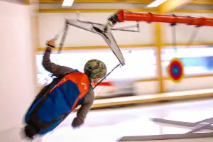 Pilot sits in the G-Force Trainer and trains handling under high acceleration forces.