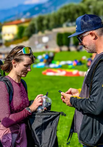 Flight instructor checks the radio to ensure communication during safety training.