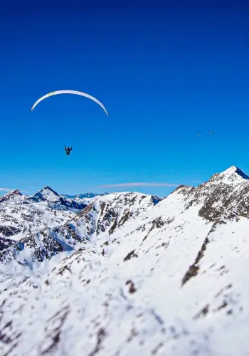 Paraguiding with touch and go Paragliding takes pilots to the most beautiful and exciting flying areas in Switzerland.