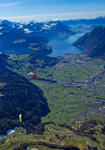 Paraguiding with touch and go Paragliding takes pilots to the most beautiful and exciting flying areas in Central Switzerland.
