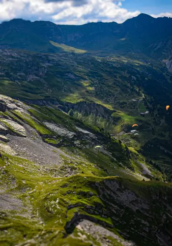 Paraguiding with touch and go Paragliding takes pilots to the most beautiful and exciting flying areas in the Swiss Alps.