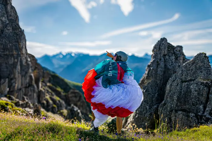A pilot with the Bantam 2 from Nova on a hike and fly adventure in the Swiss Alps. Ready for take-off
