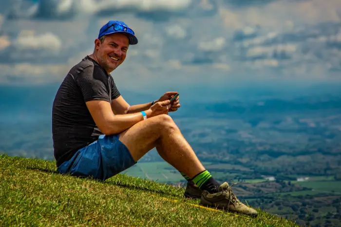Gabor Kezi, flight instructor and tandem pilot from touch and go Paragliding, at the launch site in Colombia