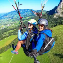 Tandem flight from the Rotenflue, with the striking Mythen mountains in the background, against the breathtaking backdrop of the Central Swiss mountain landscape.