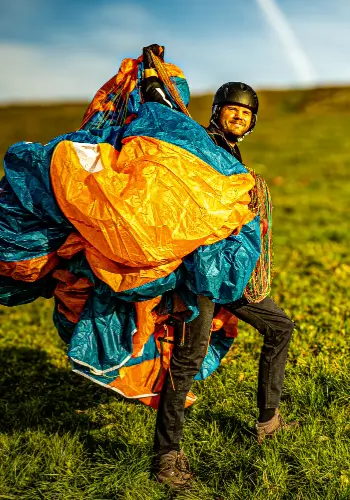 A happy student walks up the practice slope after a successful exercise, full of anticipation for the next short flight.