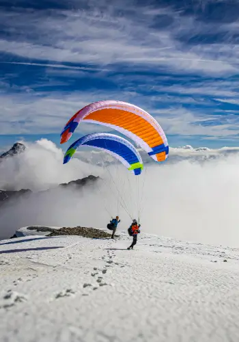 Two students prepare for the start on the practice slope - full of adventure and under professional guidance.