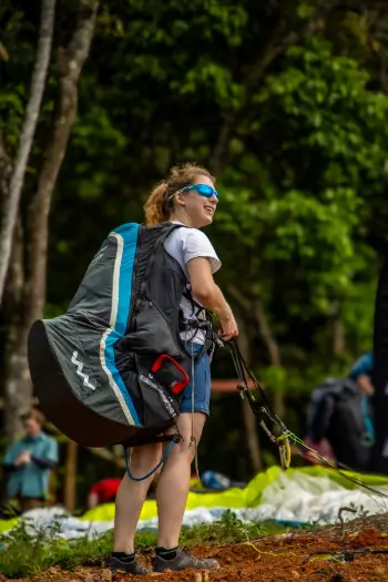 Pilot with reversible harness from WoodyValley - Here you will find high-quality paragliding equipment from top brands such as Highadventure, WoodyValley, Nova and many more.